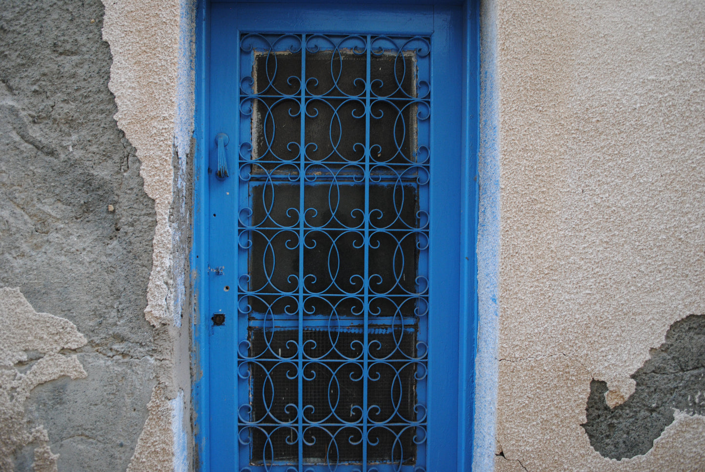 Blue Wrought-Iron Door